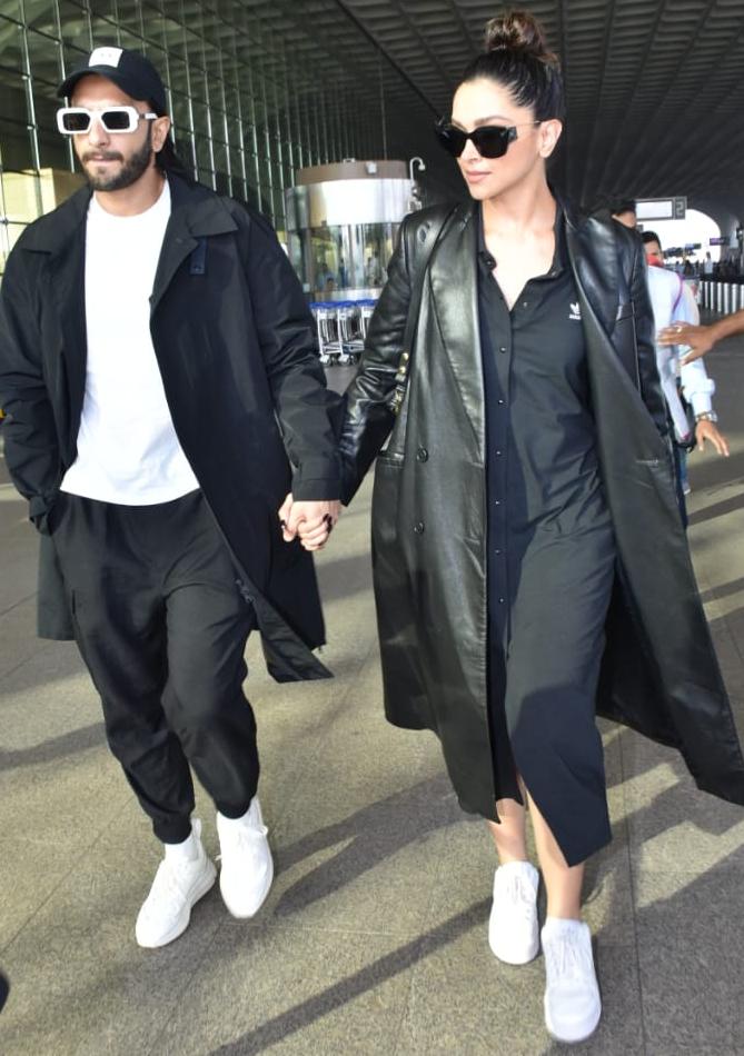 Ranveer and Deepika walked hand-in-hand as they headed towards the airport. 
